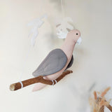 Pink Albin Cockatoo parrot on its branch