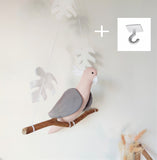 Pink Albin Cockatoo parrot on its branch