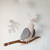 Pink Albin Cockatoo parrot on its branch